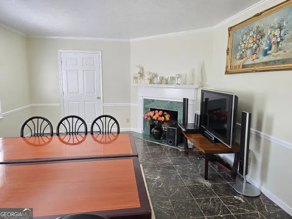 a view of a livingroom with furniture