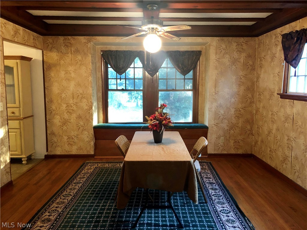 18220 Cornwall Road Cleveland, OH 44119 - Photo 6 of 22 Large dining room with continued wood ceiling detail and hardwood floors.