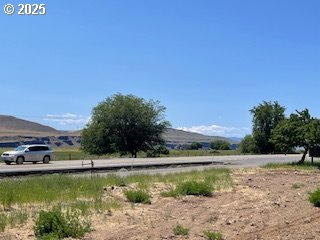 9255 Highway 14 Wishram, WA 98673 - Photo 7 of 21 a view of a lake with a house in the background