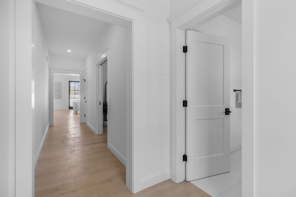 5 Lookout Lane Wakefield, RI 02879 - Photo 12 of 35 a view of a hallway with wooden floor