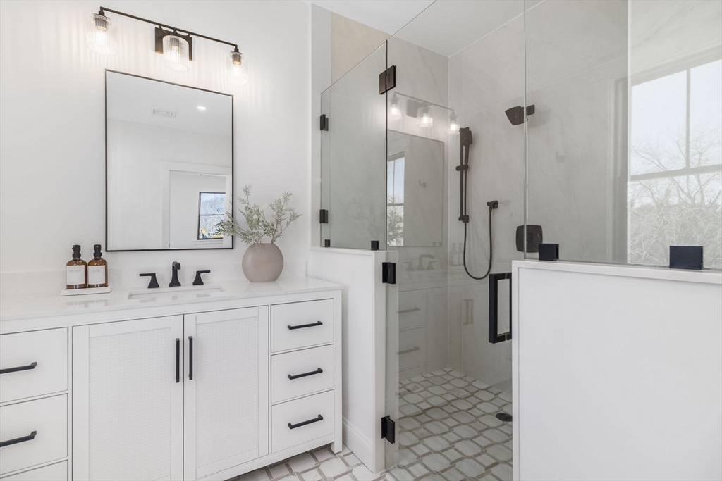 5 Lookout Lane Wakefield, RI 02879 - Photo 21 of 35 a bathroom with a double vanity sink mirror and shower