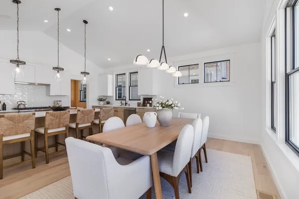 a view of a a dining room and a kitchen island