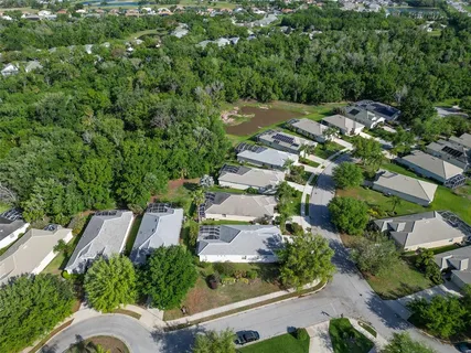 an aerial view of residential house with outdoor space