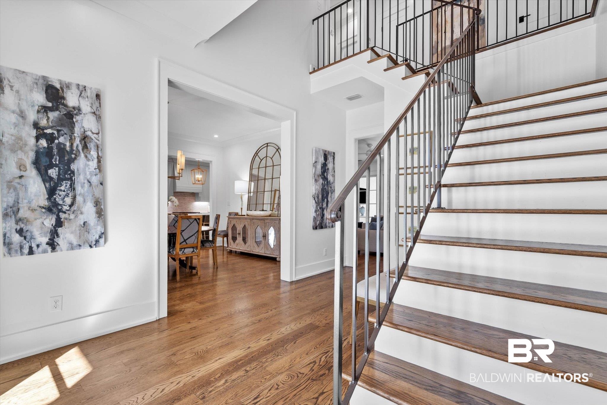 4602 Kingswood Drive Mobile, AL 36608 - Photo 2 of 45 Stairway featuring wood finished floors and baseboards