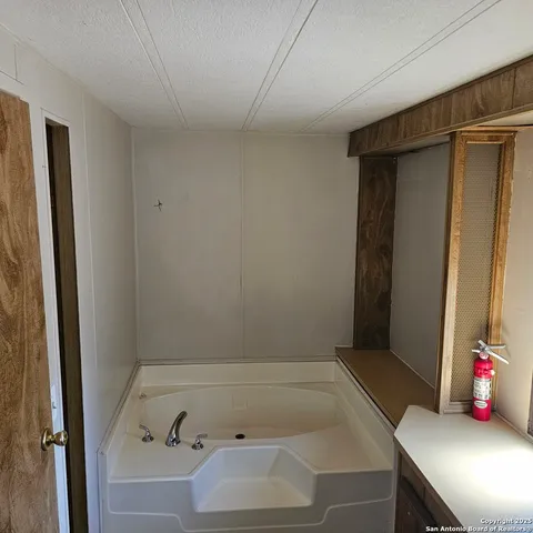 a bathroom with a bathtub