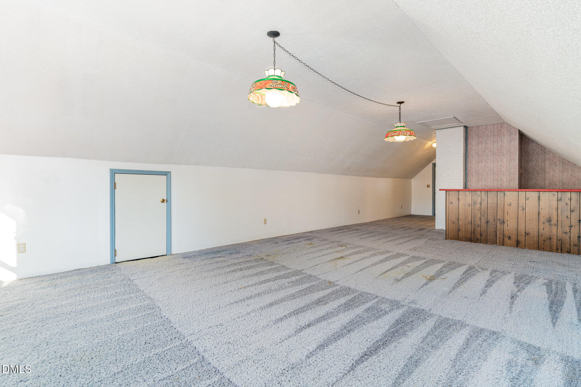 113 West Riverside Drive Smithfield, NC 27577 - Photo 21 of 43 an empty room with wooden floor and windows