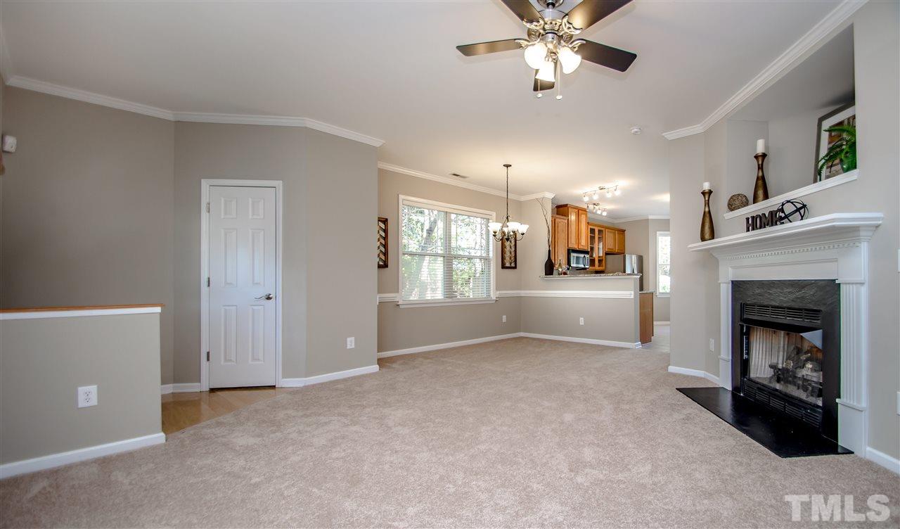 10805 Farmville Road Raleigh, NC 27614 - Photo 11 of 11 The family room with wide open floor plan connects to the kitchen. Did we say NEW CARPET throughout?