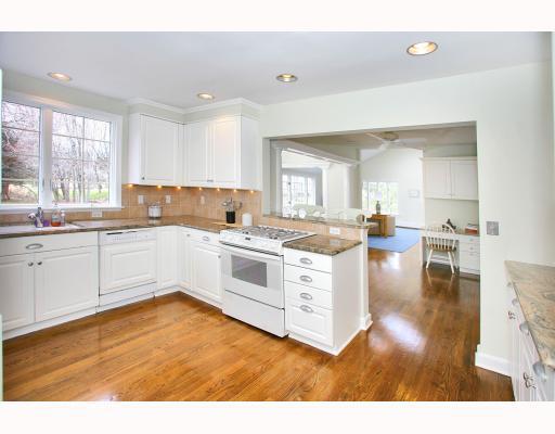 Undisclosed Address Darien, CT 06820 - Photo 6 of 10 a kitchen with a sink cabinets and wooden floor