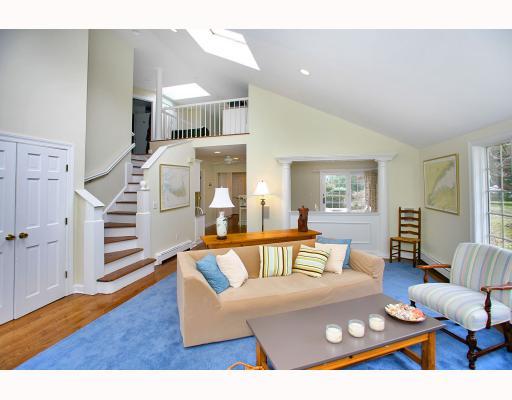 Undisclosed Address Darien, CT 06820 - Photo 8 of 10 a living room with furniture and a wooden floor