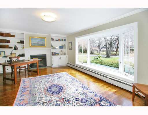 Undisclosed Address Darien, CT 06820 - Photo 9 of 10 a living room with furniture dining table and a large window