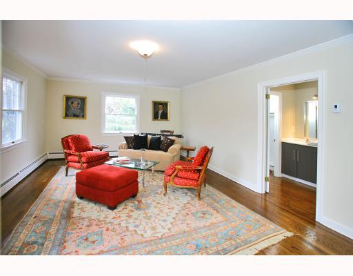 Undisclosed Address Darien, CT 06820 - Photo 10 of 10 a living room with furniture window and wooden floor