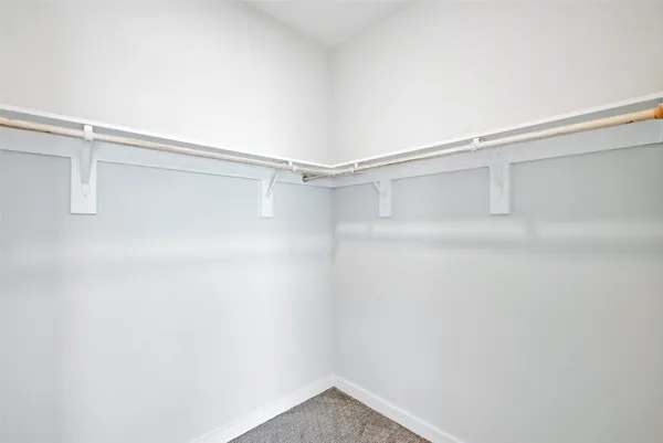 a view of an empty walk in closet