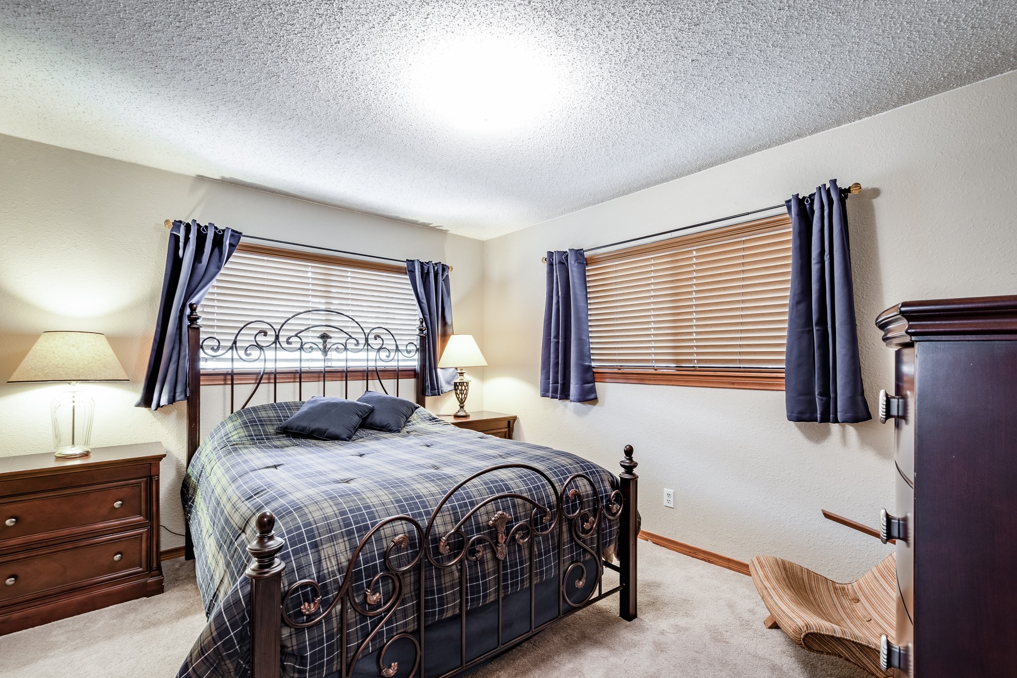 16410 Farm To Market 1485 Conroe, TX 77302 - Photo 27 of 47 a bed sitting in a bedroom next to a window