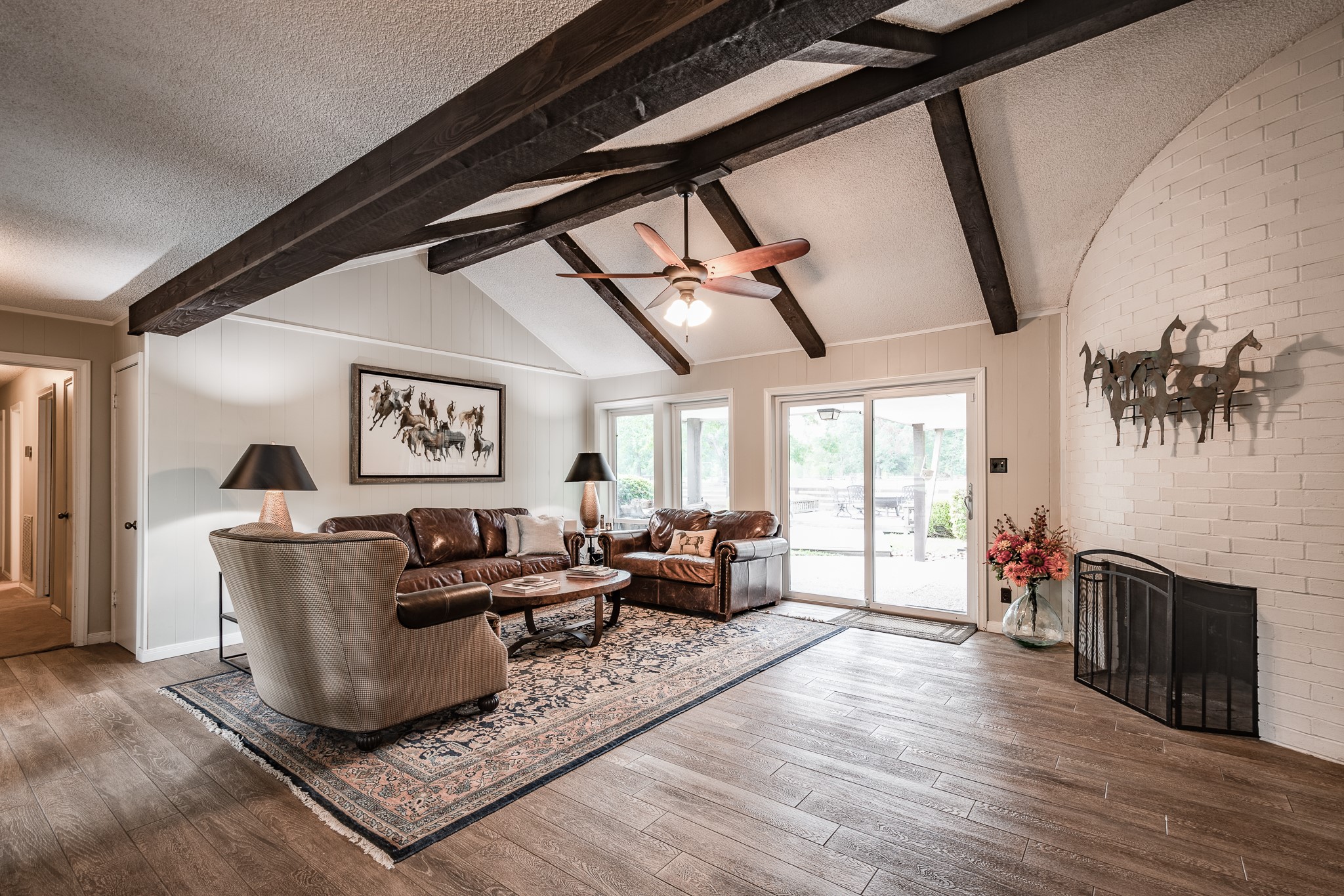 16410 Farm To Market 1485 Conroe, TX 77302 - Photo 29 of 47 a living room with furniture and a fireplace