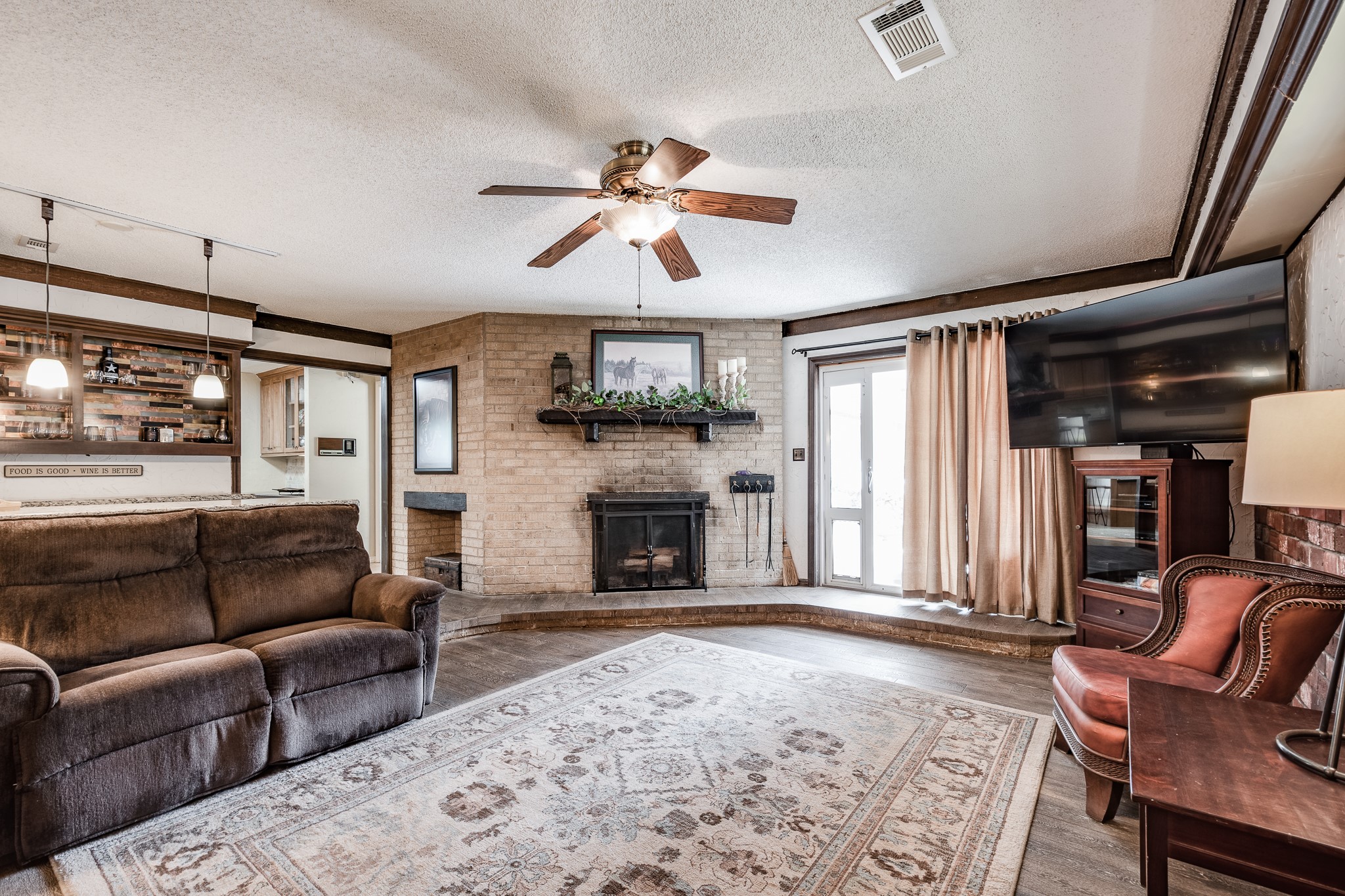 16410 Farm To Market 1485 Conroe, TX 77302 - Photo 34 of 47 a living room with furniture and a fireplace