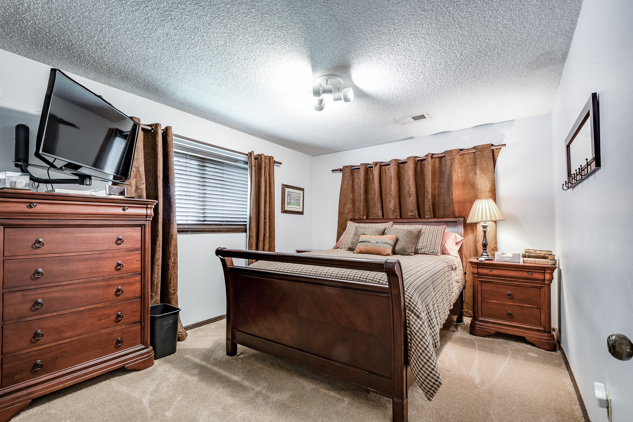 16410 Farm To Market 1485 Conroe, TX 77302 - Photo 39 of 47 a bed room with a bed window and a television