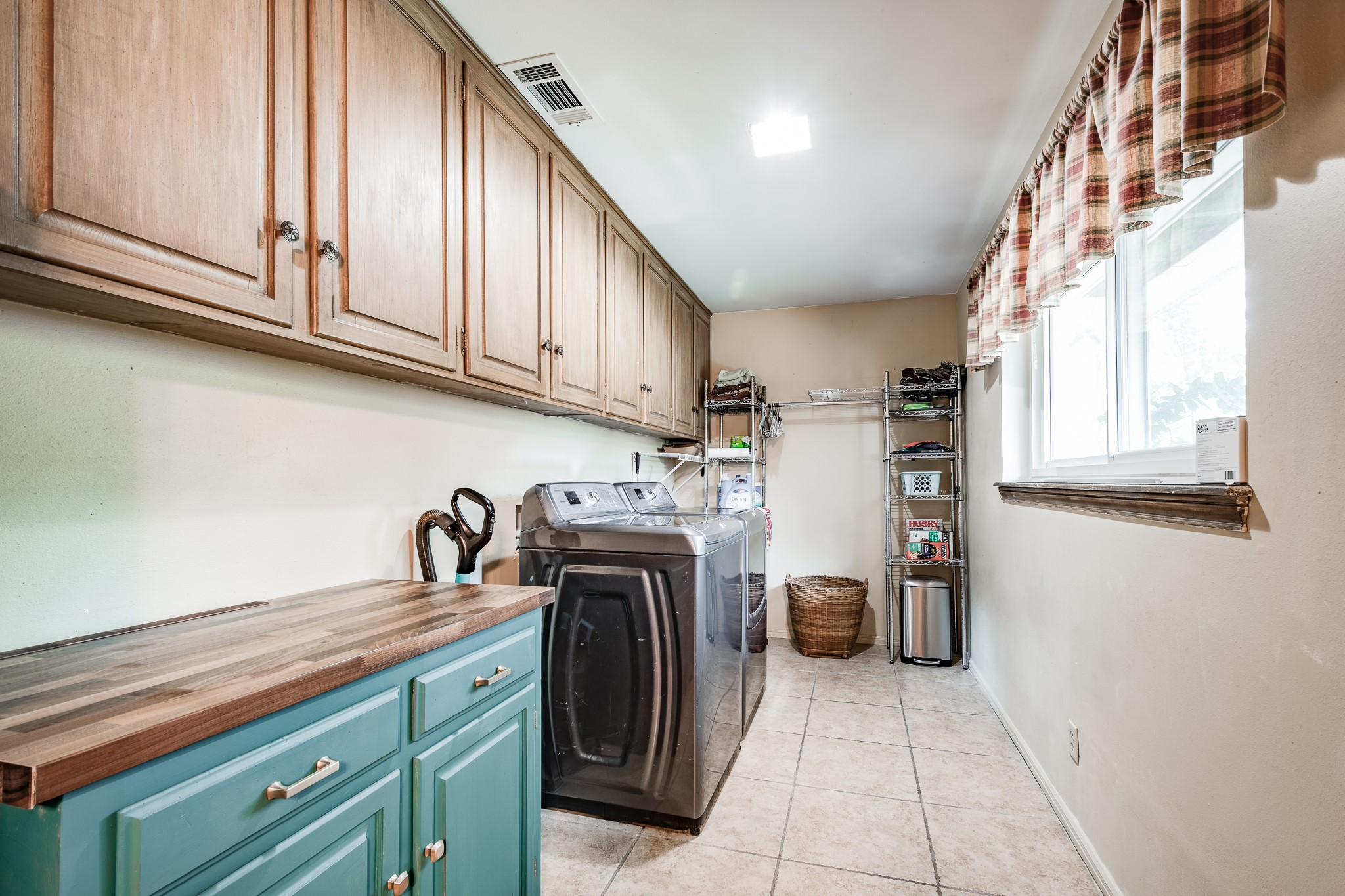 16410 Farm To Market 1485 Conroe, TX 77302 - Photo 41 of 47 a kitchen with refrigerator and cabinets