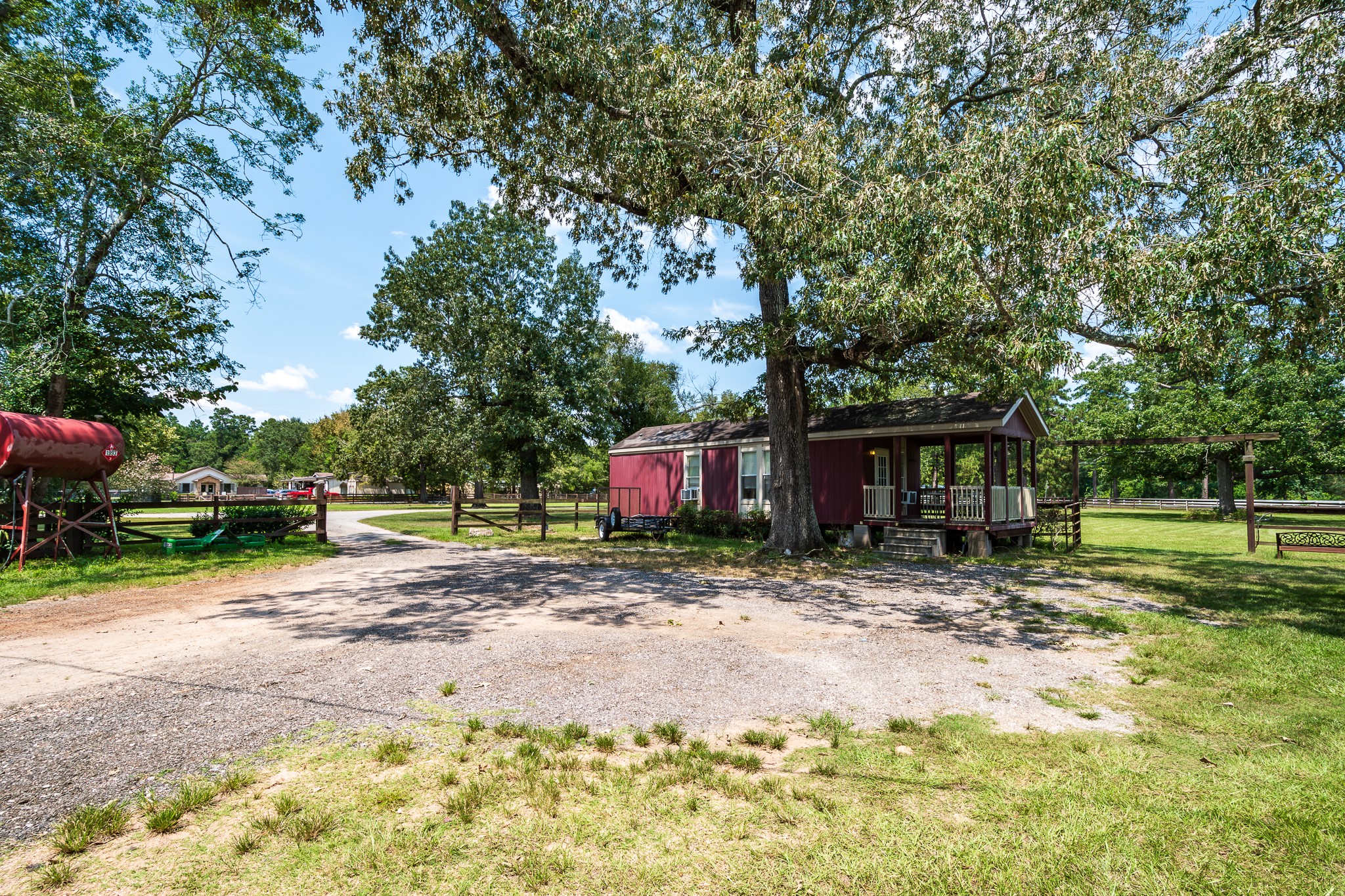 16410 Farm To Market 1485 Conroe, TX 77302 - Photo 9 of 47 a view of a house with a yard