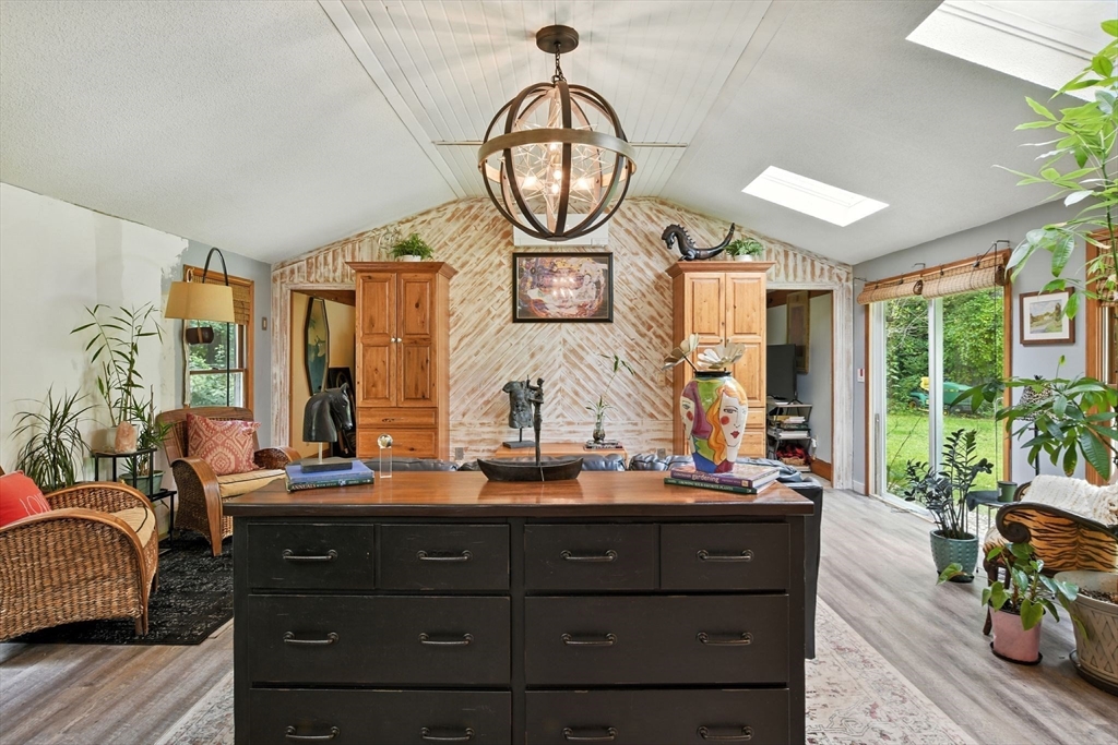 68 Stagecoach Road West Brookfield, MA 01585 - Photo 19 of 40 a living room with furniture and a large mirror