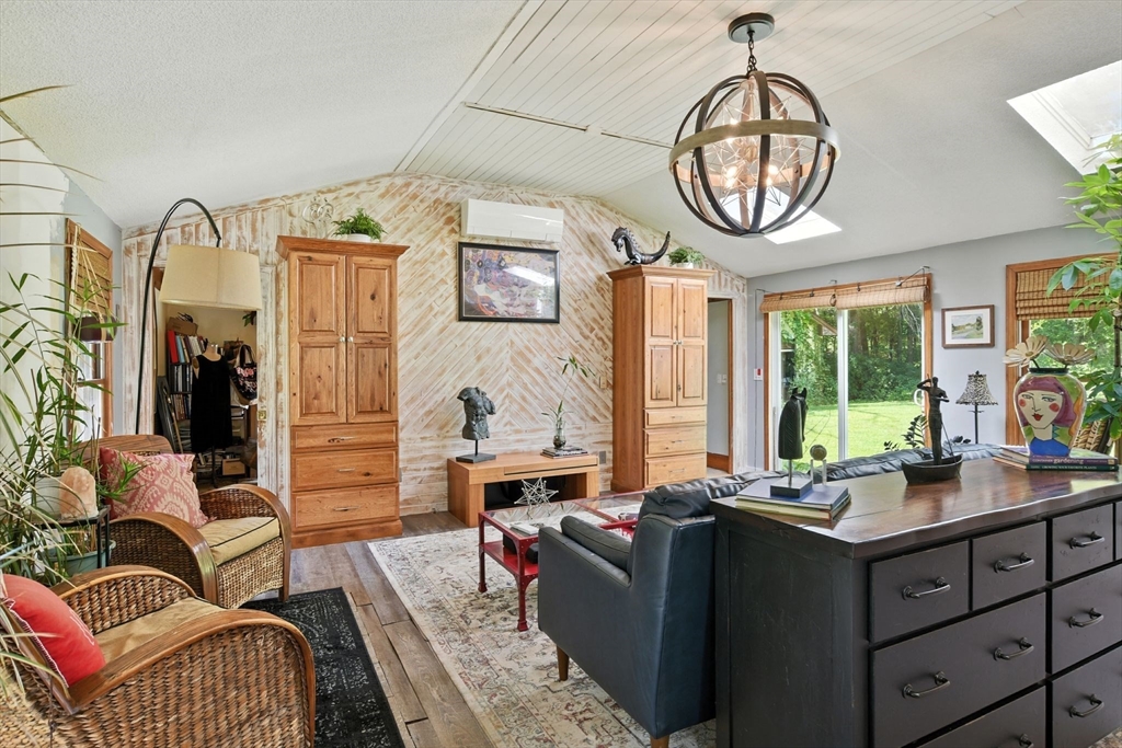 68 Stagecoach Road West Brookfield, MA 01585 - Photo 20 of 40 a living room with furniture a fireplace and a large window