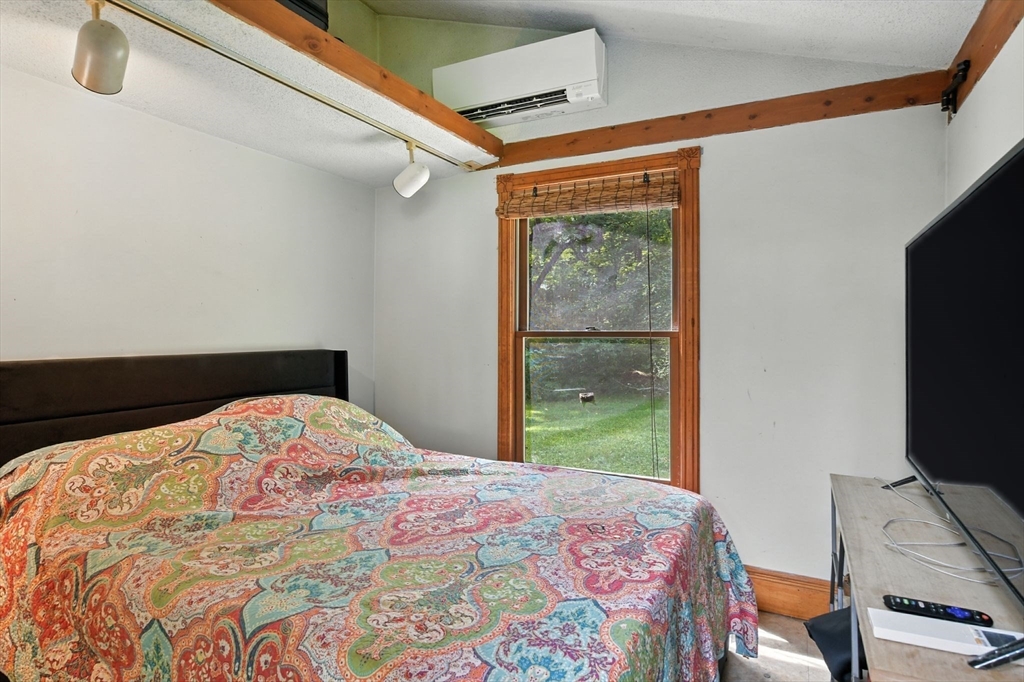 68 Stagecoach Road West Brookfield, MA 01585 - Photo 28 of 40 a bedroom with a bed and a flat screen tv