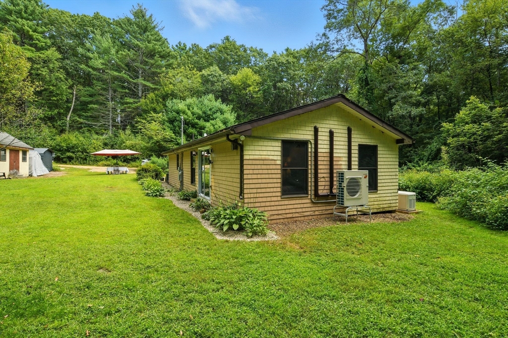 68 Stagecoach Road West Brookfield, MA 01585 - Photo 35 of 40 a view of a house with a yard and sitting area