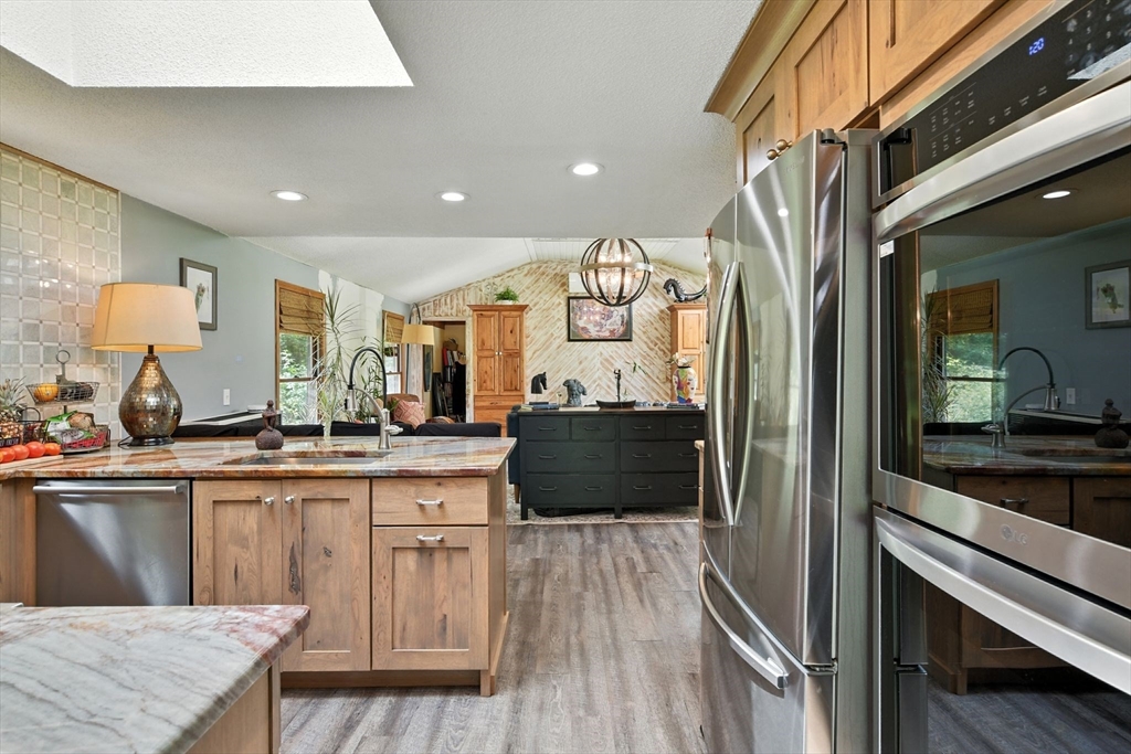 68 Stagecoach Road West Brookfield, MA 01585 - Photo 6 of 40 a kitchen with a sink stainless steel appliances and cabinets