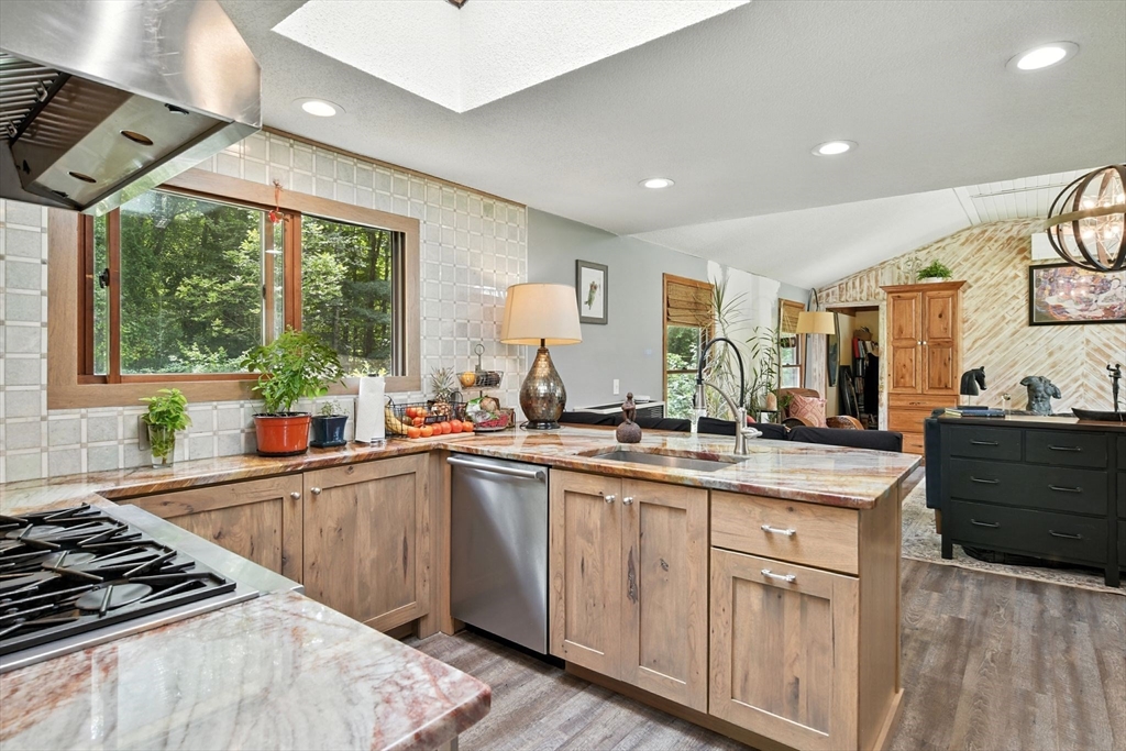 68 Stagecoach Road West Brookfield, MA 01585 - Photo 8 of 40 a kitchen with a sink stove and cabinets