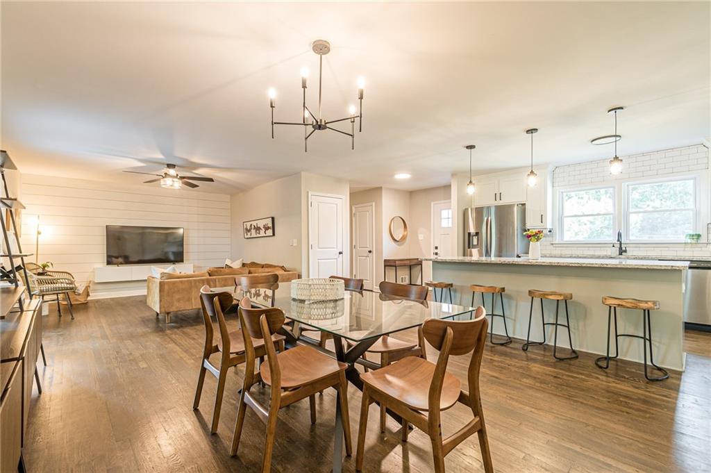 2351 Beach Way Southwest Atlanta, GA 30310 - Photo 1 of 1 a view of a dining room with furniture wooden floor and chandelier