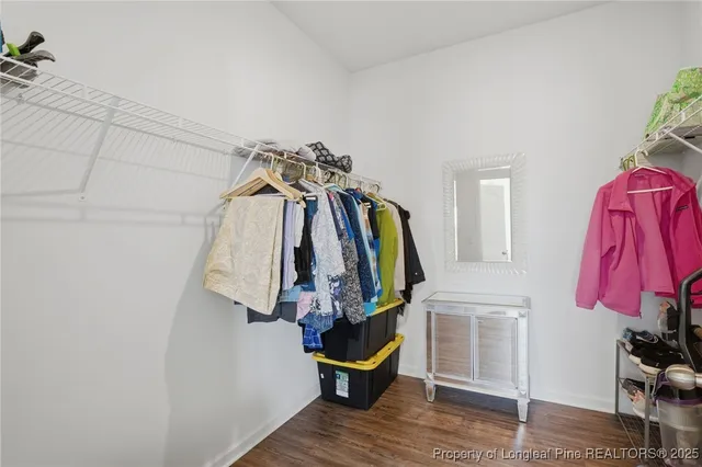 a view of a closet with storage
