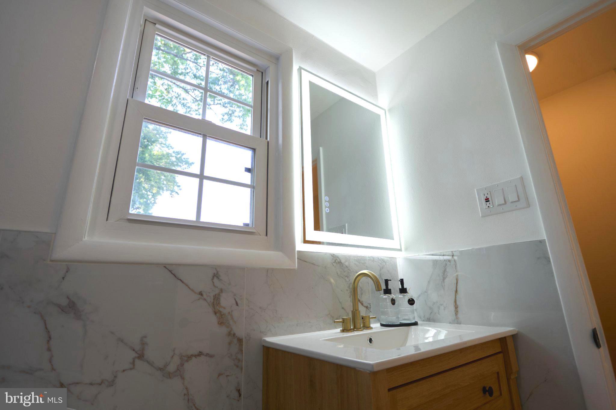 34 Hillside Road Stratford, NJ 08084 - Photo 19 of 30 Bright and airy modern bathroom oasis.