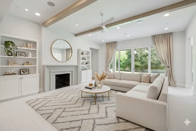 a dining hall with stainless steel appliances a table and chairs