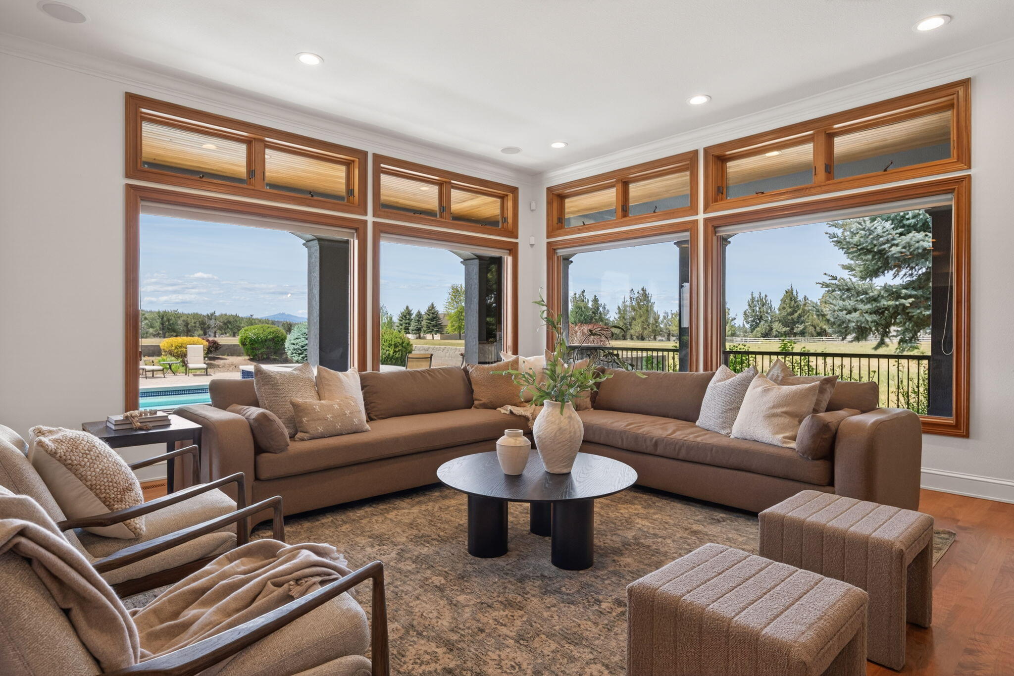 20180 Winston Loop Bend, OR 97703 - Photo 10 of 59 a living room with furniture and a large window