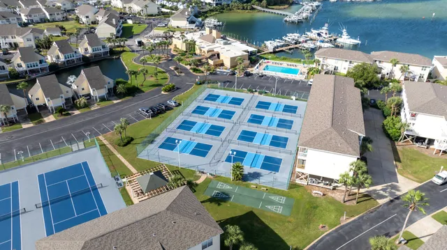 aerial view of a house with a lake view