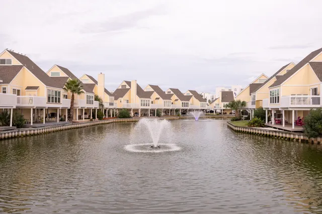 a view of a lake and houses