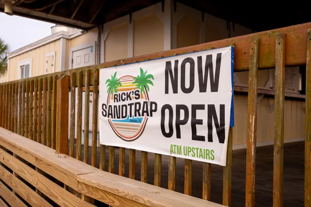 a view of a street sign on a balcony
