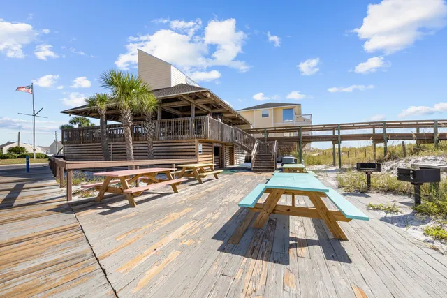 a view of a balcony with a potted plant
