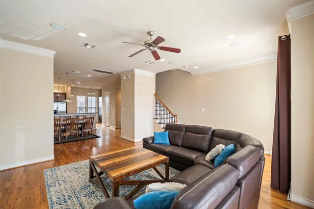 a bathroom with a granite countertop sink toilet a mirror and shower