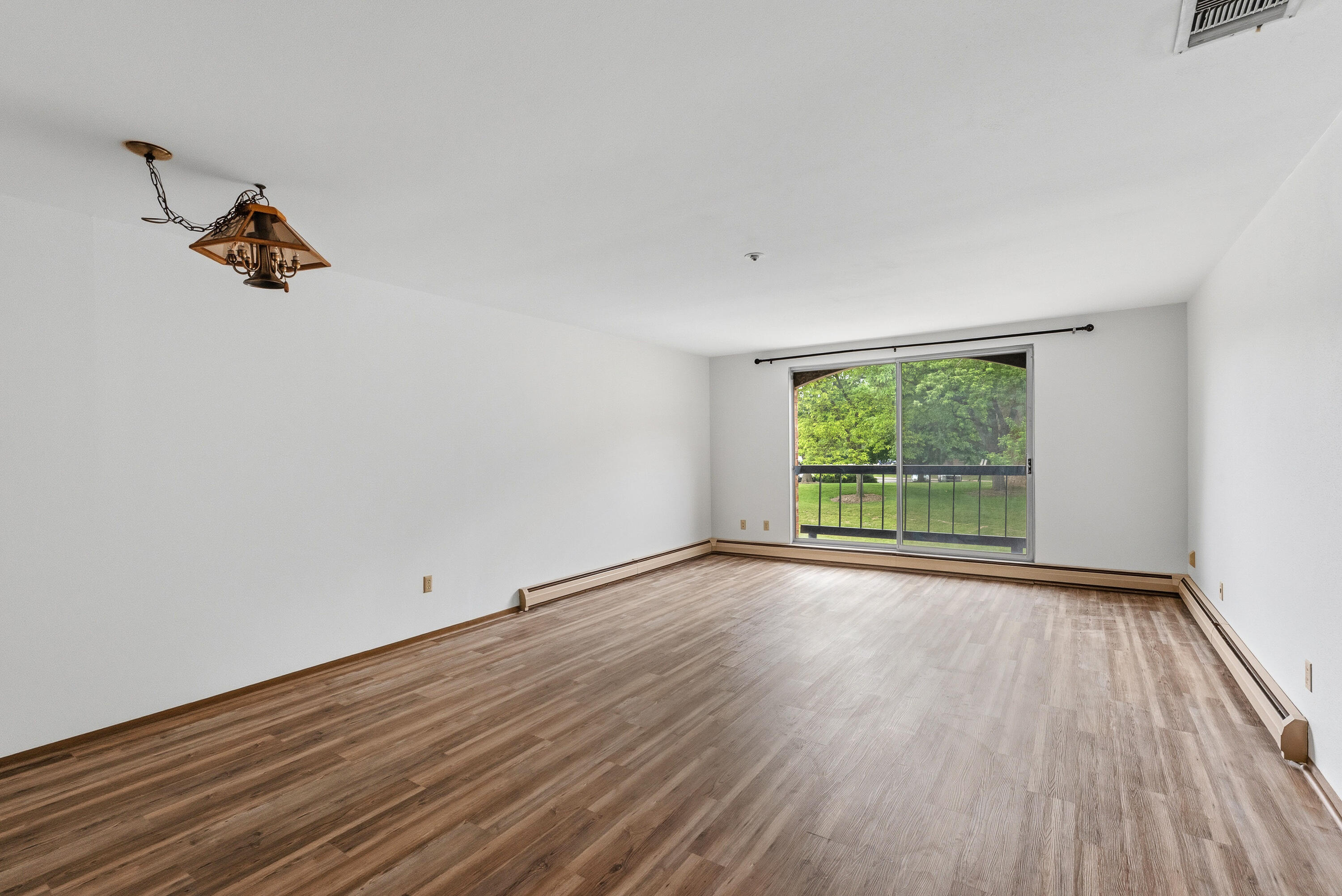 4155 West Rivers Edge Circle, Unit 4 Brown Deer, WI 53209 - Photo 2 of 18 Large Living Room, with lots of natural light.