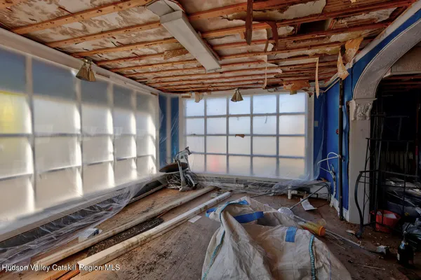 a room with furniture and window