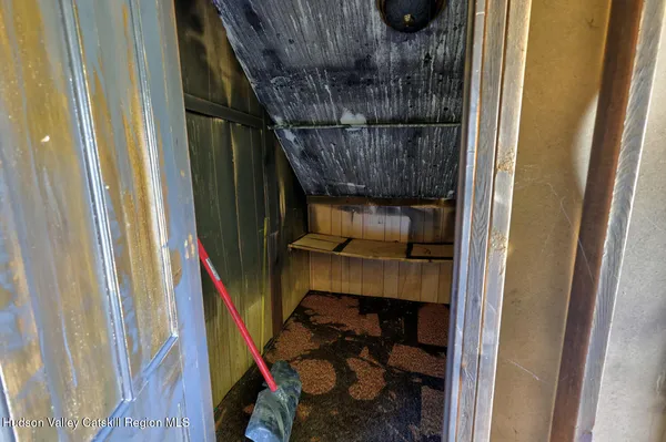 a view of a kitchen with a refrigerator