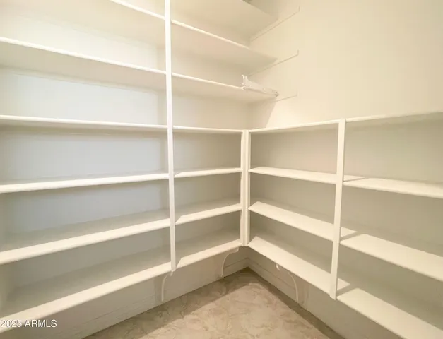 a view of an empty room with empty racks