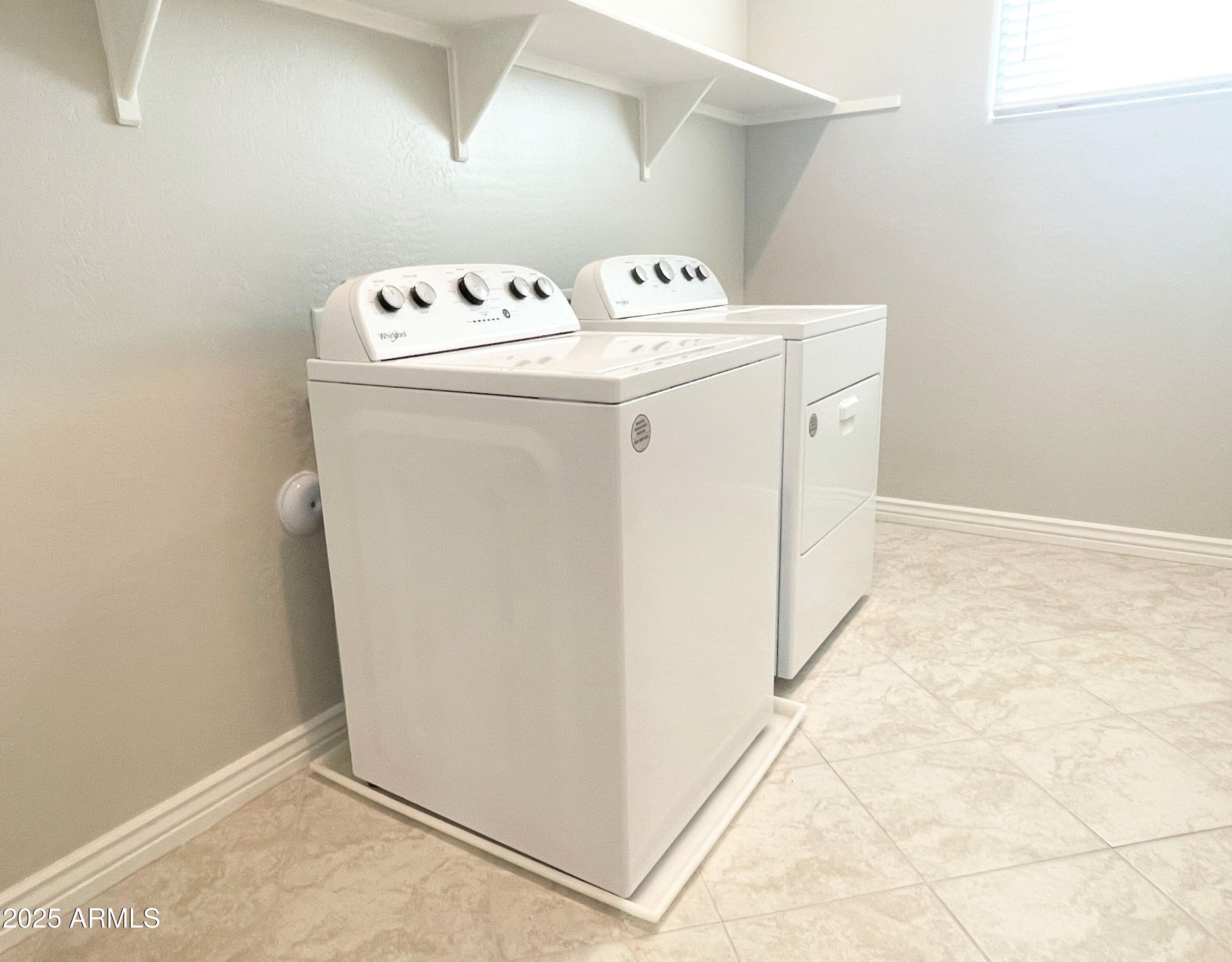 21046 East Mayberry Road Queen Creek, AZ 85142 - Photo 22 of 32 a utility room with dryer and washer