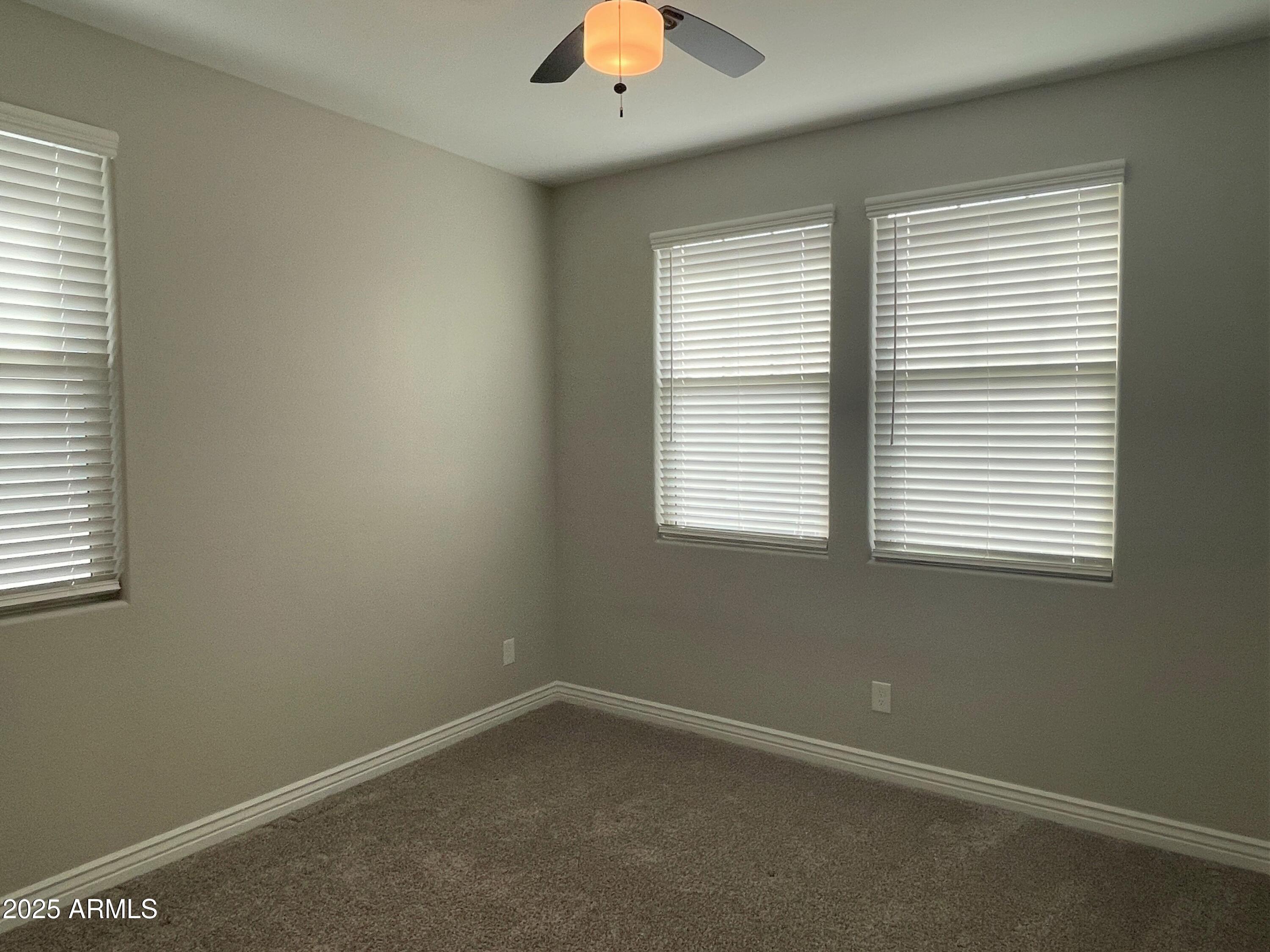 21046 East Mayberry Road Queen Creek, AZ 85142 - Photo 24 of 32 an empty room with a window