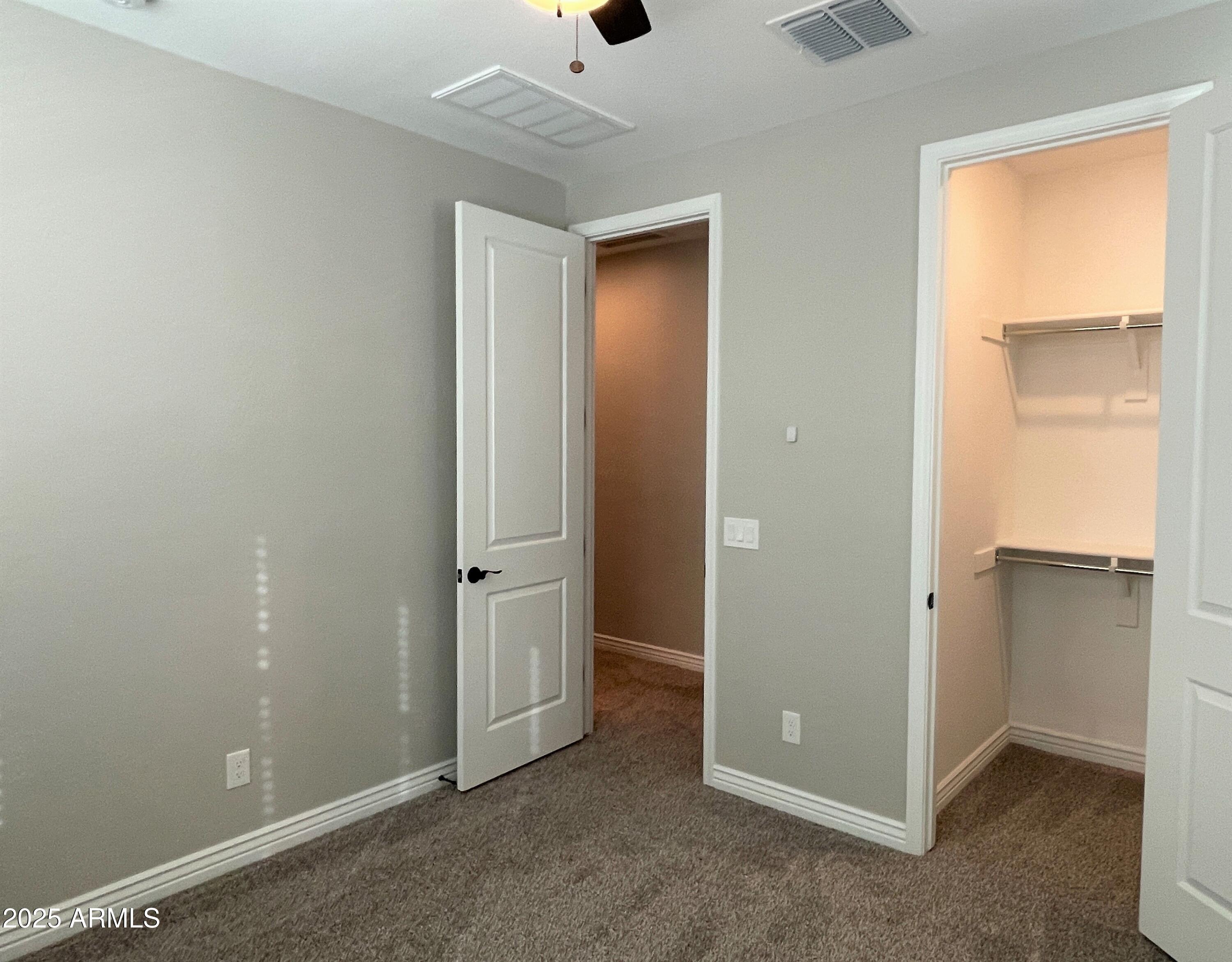 21046 East Mayberry Road Queen Creek, AZ 85142 - Photo 25 of 32 an empty room with closet