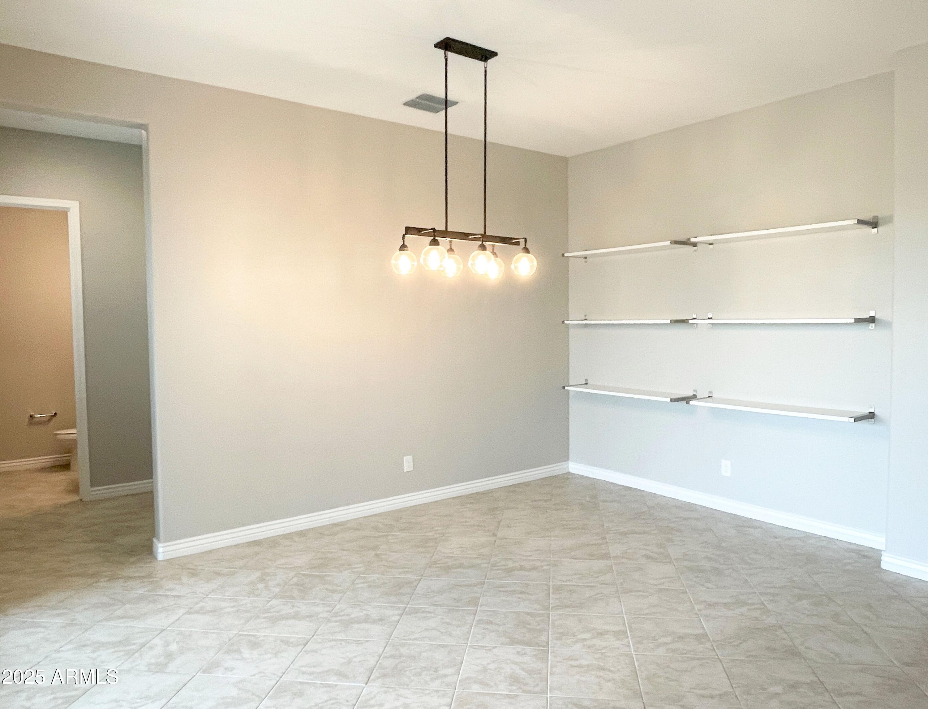 21046 East Mayberry Road Queen Creek, AZ 85142 - Photo 3 of 32 a view of an empty room