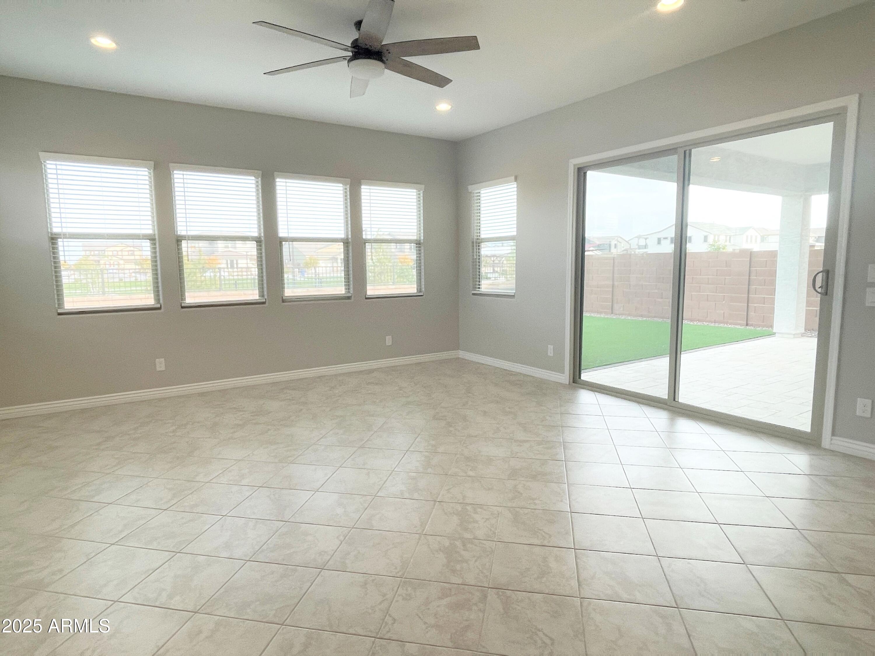 21046 East Mayberry Road Queen Creek, AZ 85142 - Photo 5 of 32 a view of an empty room with a window