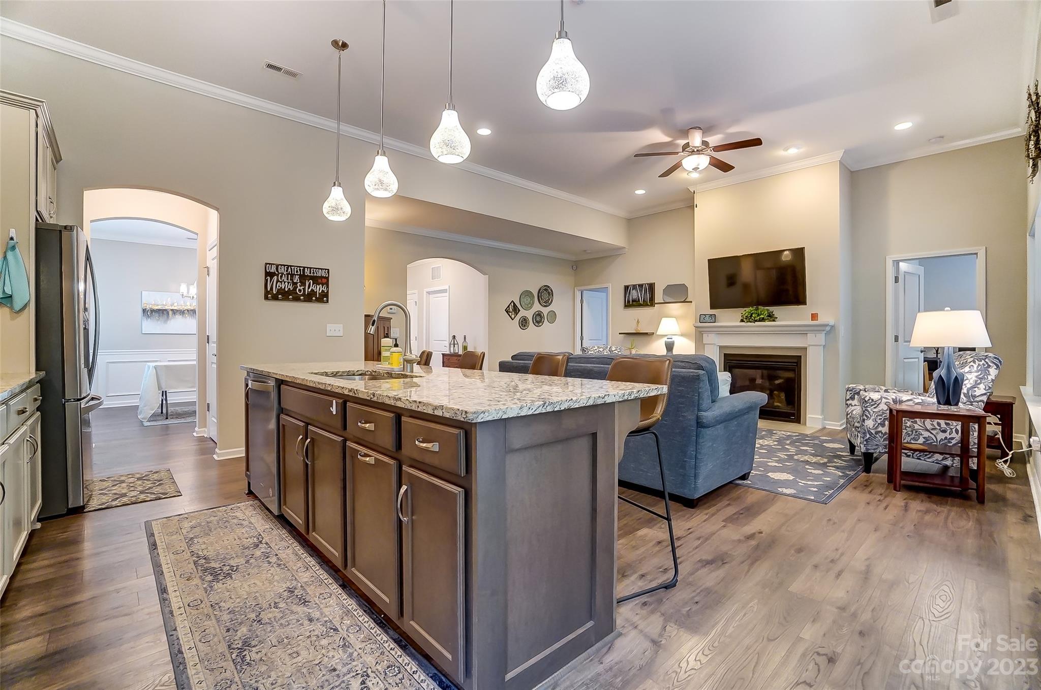 1862 Larkspur Way Tega Cay, SC 29708 - Photo 15 of 37 a spacious bathroom with a granite countertop sink a mirror and a shower