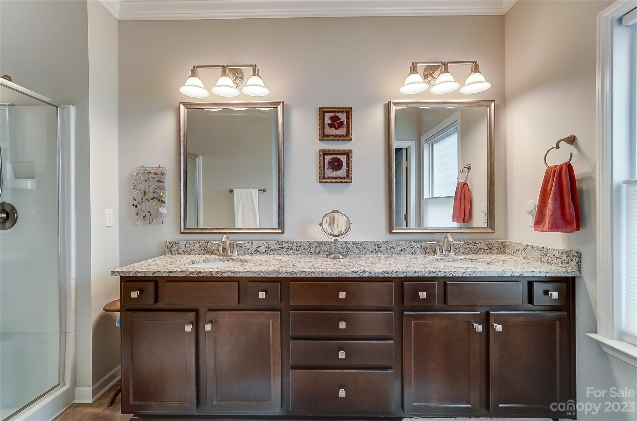 1862 Larkspur Way Tega Cay, SC 29708 - Photo 24 of 37 a bathroom with a granite countertop sink and a mirror