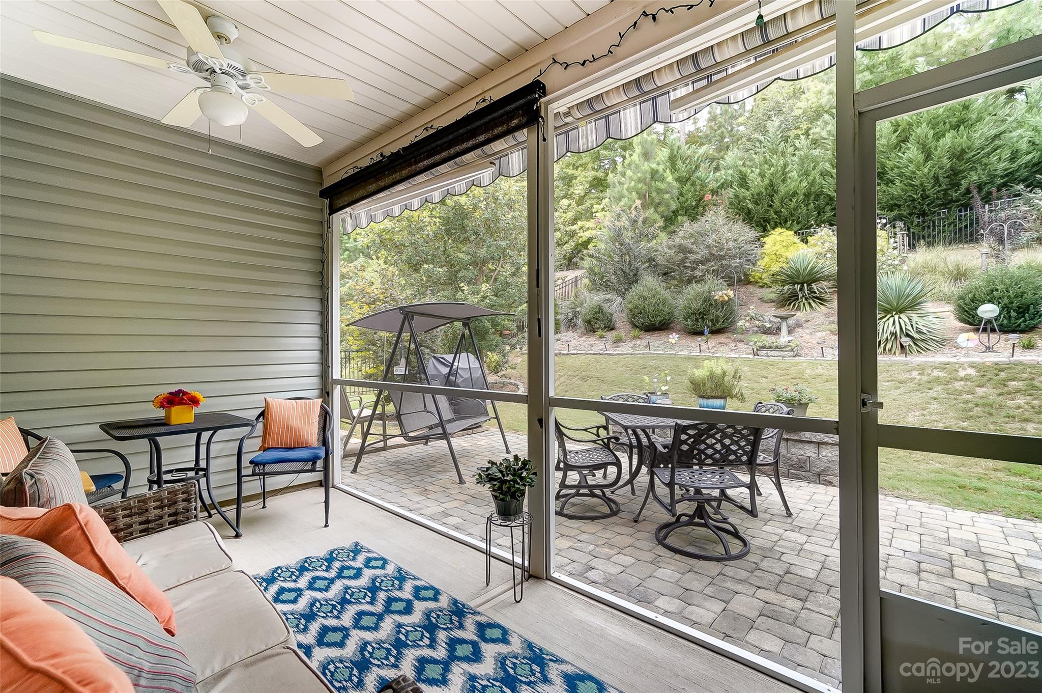 1862 Larkspur Way Tega Cay, SC 29708 - Photo 30 of 37 a living room with furniture and a floor to ceiling window